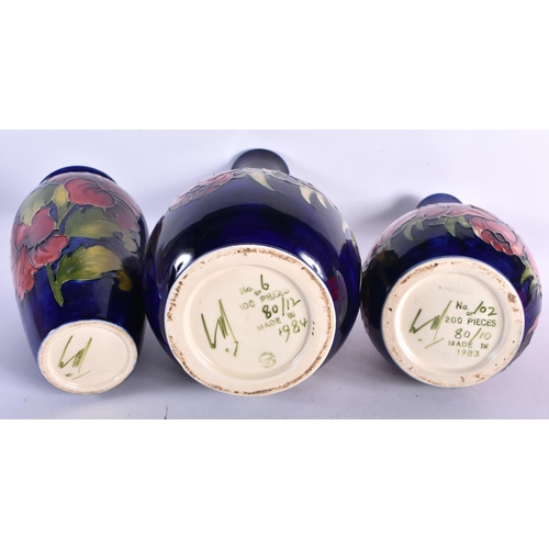 459 - THREE LARGE MOORCROFT VASES together with a bowl & cover & dish. Largest 32 cm high. (5)