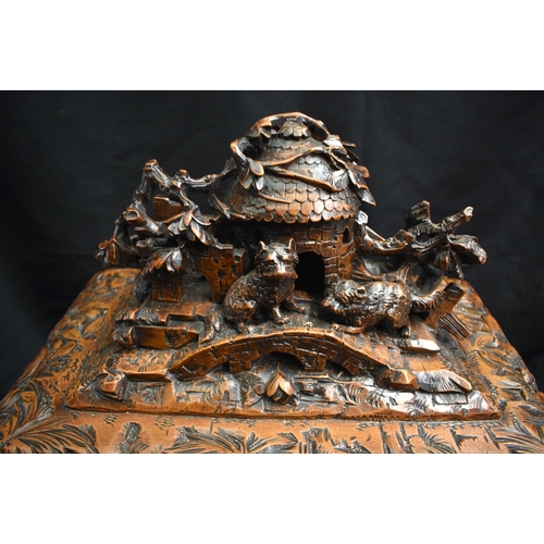 47 - A LOVELY LARGE 19TH CENTURY BAVARIAN BLACK FOREST CARVED WOOD DECANTER BOX formed as an open work ca... 