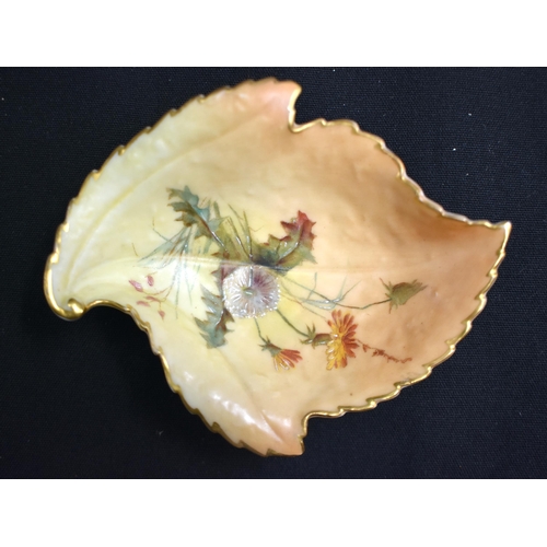 50 - A ROYAL WORCESTER FRUIT PAINTED PORCELAIN SCALLOPED PLATE by Lockyer, together with a blush ivory ju... 