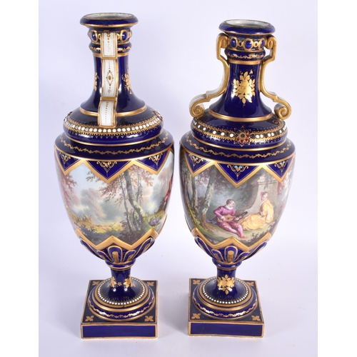 576 - A LARGE PAIR OF 19TH CENTURY FRENCH SEVRES PORCELAIN JEWELLED VASES painted with lovers within lands... 