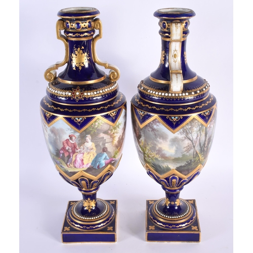 576 - A LARGE PAIR OF 19TH CENTURY FRENCH SEVRES PORCELAIN JEWELLED VASES painted with lovers within lands... 