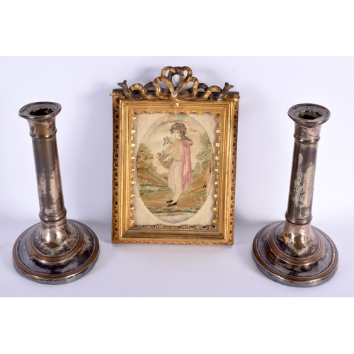 578 - A PAIR OF EARLY 19TH CENTURY OLD SHEFFIELD PLATE CANDLESTICKS together with a Regency silk work embr... 