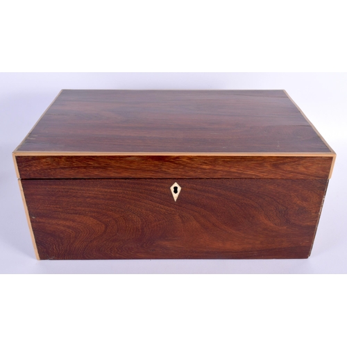 586 - AN EARLY VICTORIAN ROSEWOOD BOX containing flatware. Box 38 cm x 22 cm x 18 cm.