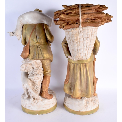 589 - A VERY LARGE PAIR OF AUSTRIAN ROYAL DUX BISQUE PORCELAIN FIGURES OF PEASANTS. 50 cm x 15 cm.