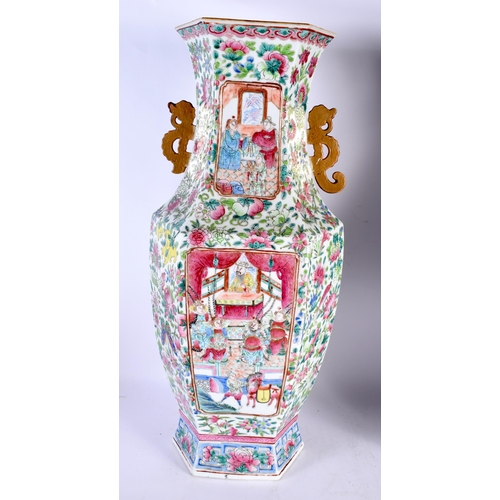 593 - A FINE LARGE PAIR OF 19TH CENTURY CHINESE CANTON FAMILLE ROSE TWIN HANDLED VASES Qing, painted with ... 