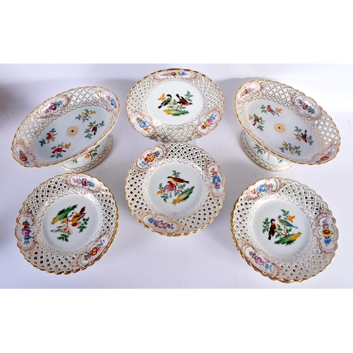 594 - A 19TH CENTURY MEISSEN PORCELAIN PART DESSERT SERVICE comprising of two 27 cm x 13 cm pierced pedest... 