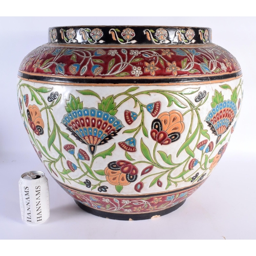 596 - A VERY LARGE EARLY 20TH CENTURY EUROPEAN ENAMELLED POTTERY JARDINIERE possibly Boch Freres, painted ... 