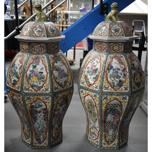 599 - A VERY LARGE PAIR OF CHINESE REPUBLICAN PERIOD COUNTRY HOUSE PORCELAIN VASES AND COVERS painted with... 