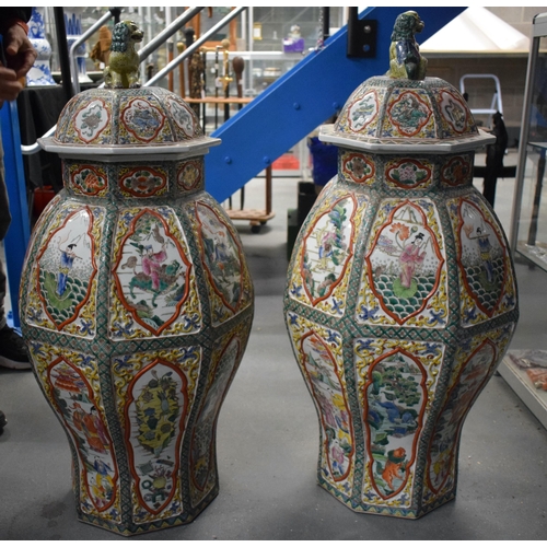 599 - A VERY LARGE PAIR OF CHINESE REPUBLICAN PERIOD COUNTRY HOUSE PORCELAIN VASES AND COVERS painted with... 