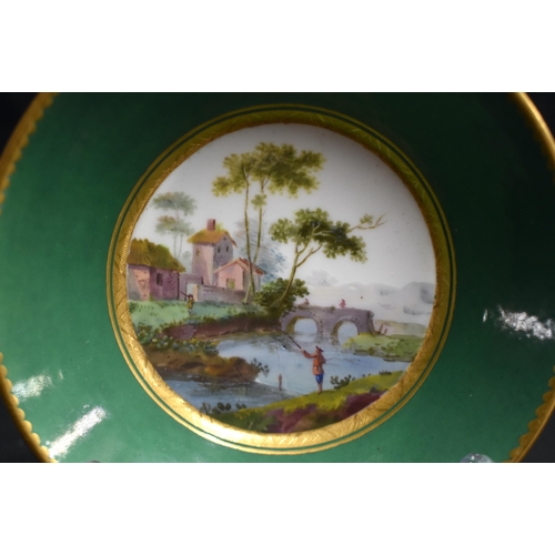 60 - AN 18TH CENTURY SEVRES PORCELAIN APPLE GREEN COFFEE CAN AND SAUCER painted with landscapes under a d... 