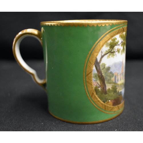 60 - AN 18TH CENTURY SEVRES PORCELAIN APPLE GREEN COFFEE CAN AND SAUCER painted with landscapes under a d... 