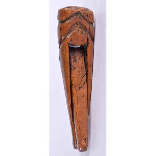 606 - A LOVELY PAIR OF 18TH CENTURY CARVED TREEN WOOD NUTCRACKERS, formed as a male with a large chin, bea... 