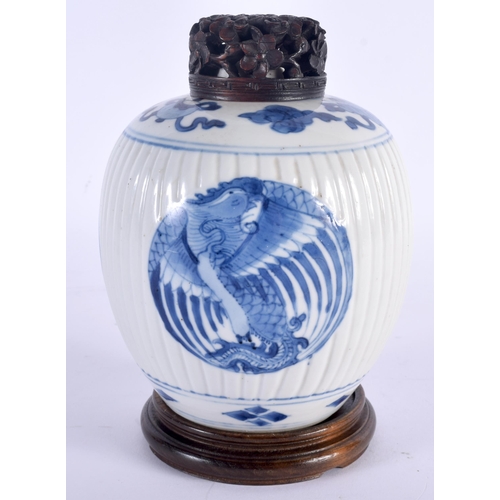 609 - A 17TH  CENTURY CHINESE BLUE AND WHITE PORCELAIN GINGER JAR AND COVER Kangxi, painted with stylised ... 