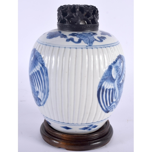 609 - A 17TH  CENTURY CHINESE BLUE AND WHITE PORCELAIN GINGER JAR AND COVER Kangxi, painted with stylised ... 