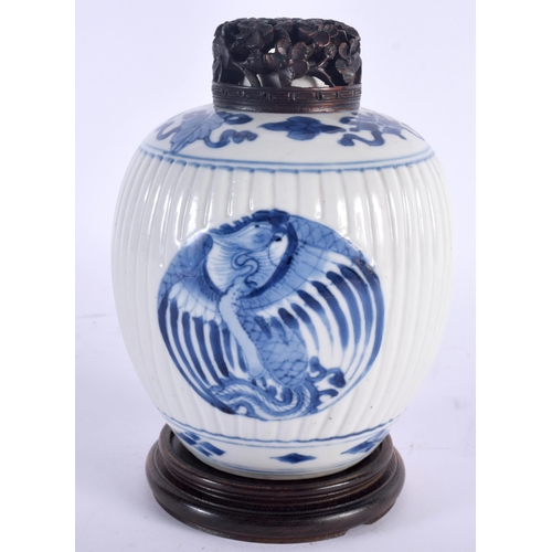 609 - A 17TH  CENTURY CHINESE BLUE AND WHITE PORCELAIN GINGER JAR AND COVER Kangxi, painted with stylised ... 