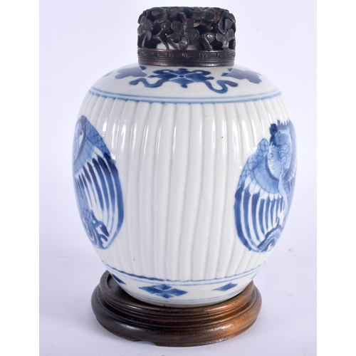 609 - A 17TH  CENTURY CHINESE BLUE AND WHITE PORCELAIN GINGER JAR AND COVER Kangxi, painted with stylised ... 