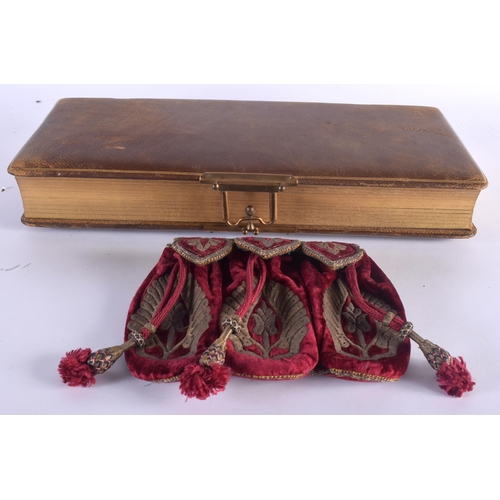 613 - AN ANTIQUE MIDDLE EASTERN GOLD THREAD EMBROIDERED PURSE together with a leather photograph album. La... 