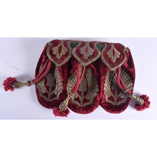 613 - AN ANTIQUE MIDDLE EASTERN GOLD THREAD EMBROIDERED PURSE together with a leather photograph album. La... 