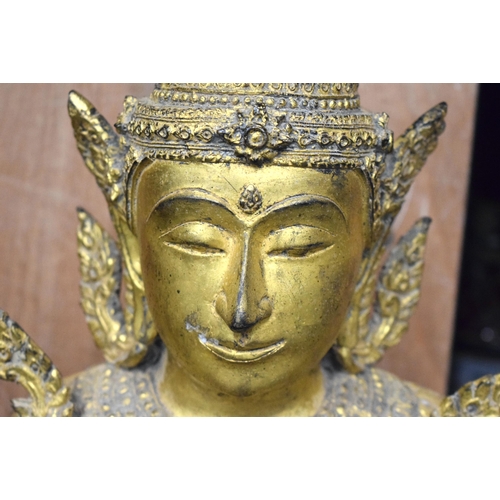 662 - A LARGE 19TH CENTURY THAI SOUTH EAST ASIAN BRONZE BUDDHA modelled embellished in flowers and vines. ... 