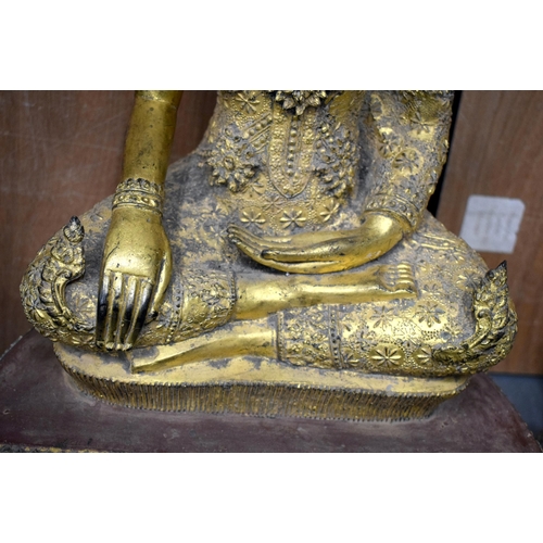 662 - A LARGE 19TH CENTURY THAI SOUTH EAST ASIAN BRONZE BUDDHA modelled embellished in flowers and vines. ... 