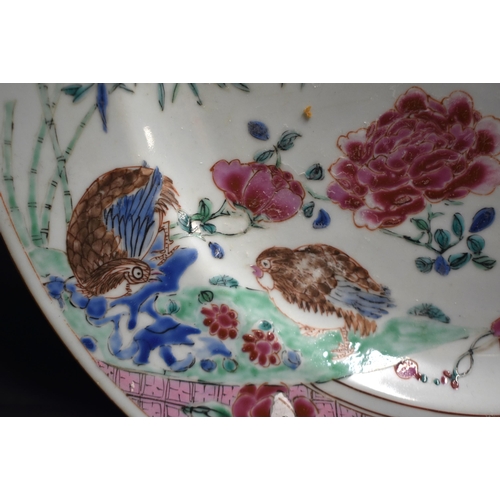 69 - A LARGE EARLY 18TH CENTURY CHINESE FAMILLE ROSE PORCELAIN DISH Yongzheng/Qianlong. 32 cm diameter.