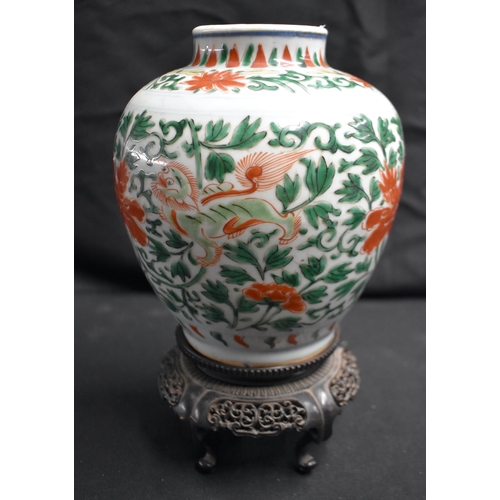 70 - A 16TH/17TH CENTURY CHINESE WUCAI PORCELAIN GLOBULAR VASE Ming, painted with Buddhistic lions amongs... 