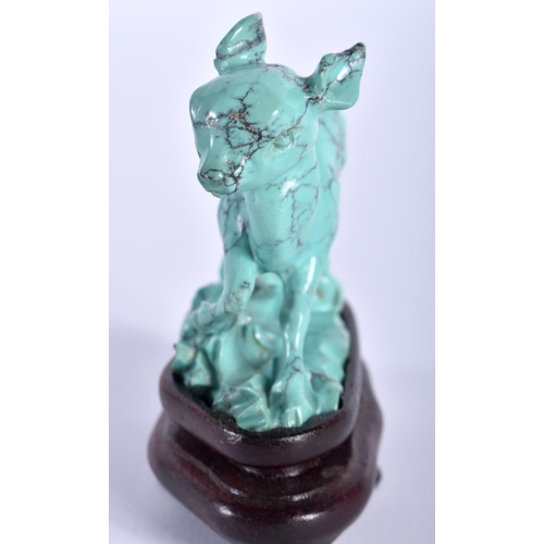 75 - A 19TH CENTURY CHINESE CARVED TURQUOISE FIGURE OF A ROAMING DEER Qing, modelled upon a naturalistic ... 