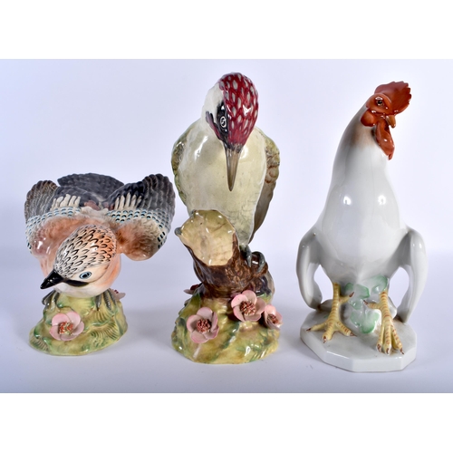 77 - A LARGE HUNGARIAN HEREND PORCELAIN COCKERELL together with two large Beswick birds. Largest 24 cm x ... 