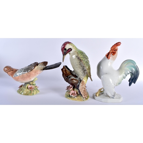 77 - A LARGE HUNGARIAN HEREND PORCELAIN COCKERELL together with two large Beswick birds. Largest 24 cm x ... 