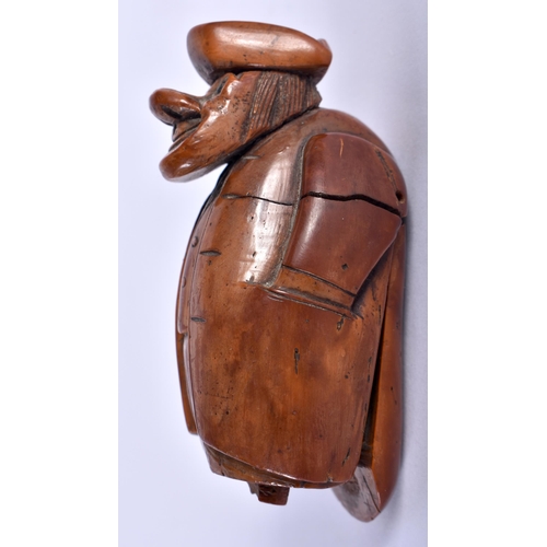 86 - AN 18TH CENTURY FRENCH CARVED COQUILLA NUT SNUFF BOX modelled as a big nosed male wearing a tricorn ... 