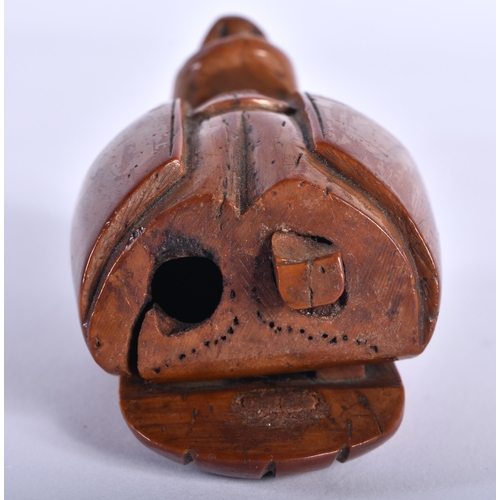 86 - AN 18TH CENTURY FRENCH CARVED COQUILLA NUT SNUFF BOX modelled as a big nosed male wearing a tricorn ... 