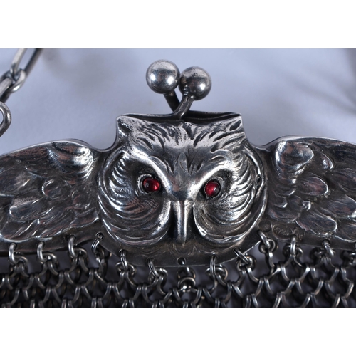 89 - A CHARMING SILVER AND RUBY ENGLISH SILVER OWL PURSE by 'RF' formed with wings over draped chainmail.... 