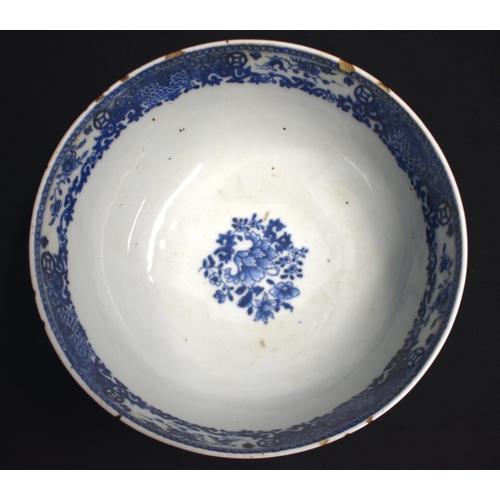 9 - AN 18TH CENTURY CHINESE EXPORT BLUE AND WHITE PORCELAIN BOWL Qianlong, painted with figures standing... 