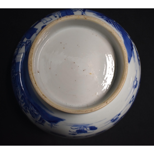 9 - AN 18TH CENTURY CHINESE EXPORT BLUE AND WHITE PORCELAIN BOWL Qianlong, painted with figures standing... 