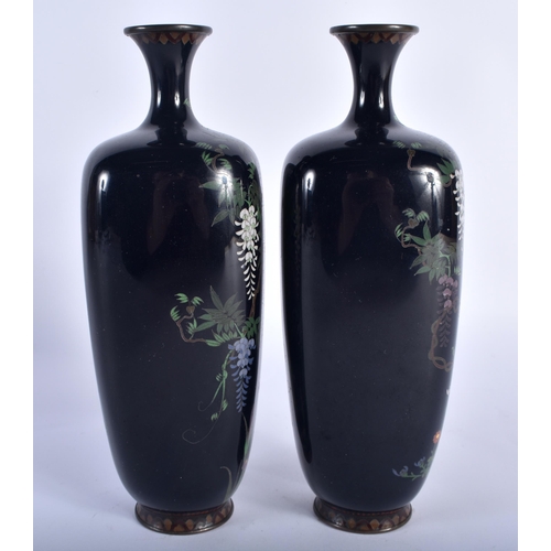 90 - A PAIR OF 19TH CENTURY JAPANESE MEIJI PERIOD CLOISONNE ENAMEL VASES decorated with hanging wisteria.... 