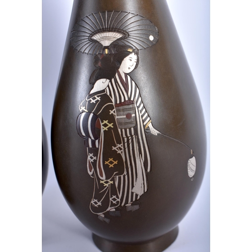 98 - A GOOD PAIR OF 19TH CENTURY JAPANESE MEIJI PERIOD SILVER INLAID NAGOYA BRONZE VASES depicting geisha... 