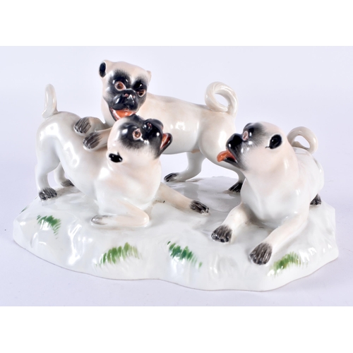 100A - A SET OF FOUR MEISSEN PORCELAIN PUG DOGS of various sizes. Largest 14cm