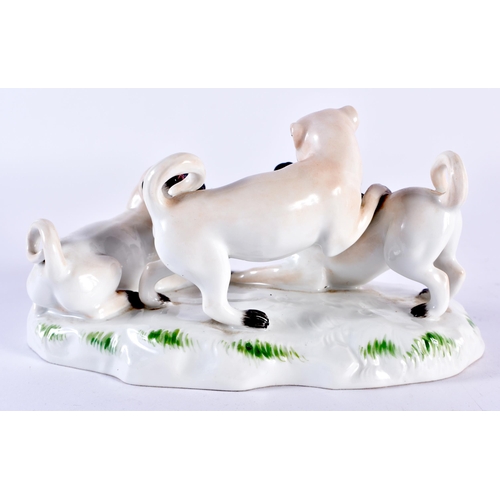 100A - A SET OF FOUR MEISSEN PORCELAIN PUG DOGS of various sizes. Largest 14cm