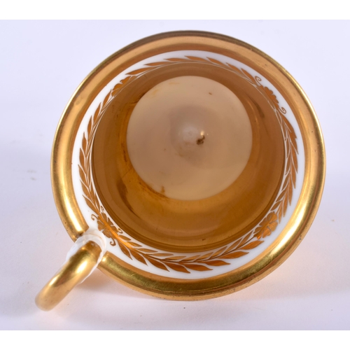 104 - AN EARLY 19TH CENTURY FRENCH PARIS EMPIRE PORCELAIN CUP AND SAUCER together with a later French Sevr... 