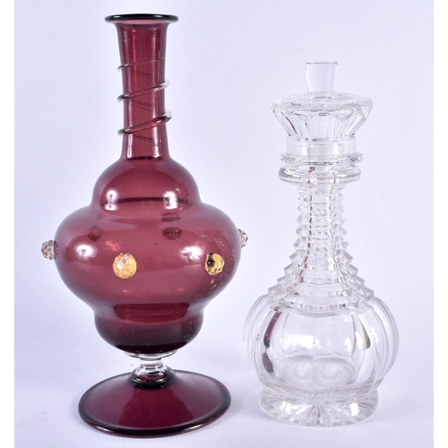 107 - A RARE ANTIQUE CUT GLASS DECANTER AND STOPPER together with a Venetian ruby glass vase. Largest 23.5... 