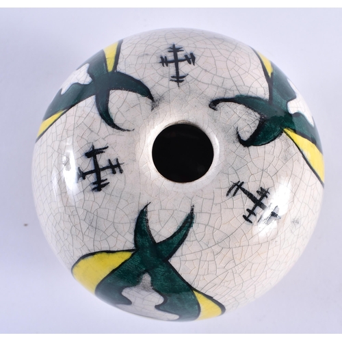 111 - AN ARMENIAN GREEN AND YELLOW HANGING BALL. 9 cm wide.