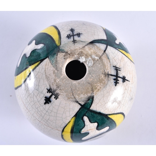 111 - AN ARMENIAN GREEN AND YELLOW HANGING BALL. 9 cm wide.