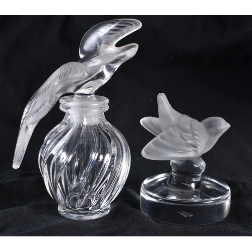 116 - A LALIQUE GLASS SCENT BOTTLE together with a Lalique glass bird. Largest 11 cm high. (2)