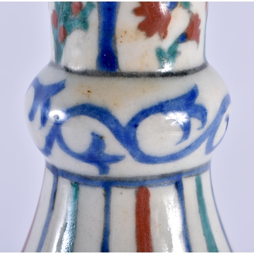 124 - A LARGE TURKISH OTTOMAN IZNIK POTTERY BULBOUS VASE painted with floral sprays. 40 cm x 17 cm.