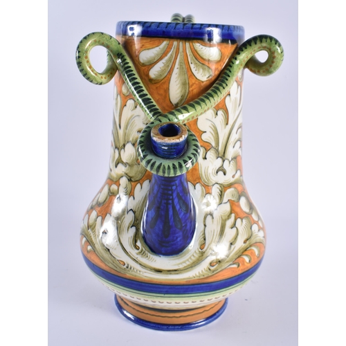 131 - AN ITALIAN MAJOLICA FAIENCE SERPENT JUG painted with floral sprays. 24 cm x 17 cm.