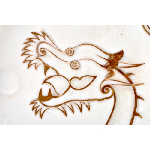 134 - AN EXTREMELY RARE IRISH BELLEEK PORCELAIN GILDED DRAGON TRAY decorated in relief with a dragon pursu... 