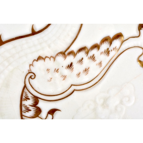 134 - AN EXTREMELY RARE IRISH BELLEEK PORCELAIN GILDED DRAGON TRAY decorated in relief with a dragon pursu... 