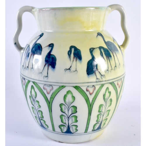 138 - AN UNUSUAL EUROPEAN EARLY 20TH CENTURY TWIN HANDLED PORCELAIN VASE signed A.H, painted with birds st... 