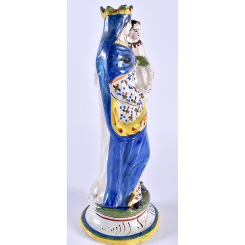 144 - AN 18TH/19TH CENTURY FRENCH FAIENCE FIGURE OF MADONNA AND CHILD. 23 cm high.