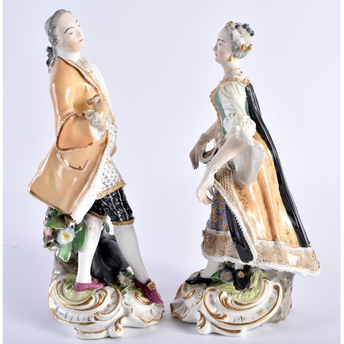 167 - Early 19th century Derby pair of figures of a gentleman and a lady dressed in Regency style, red mar... 